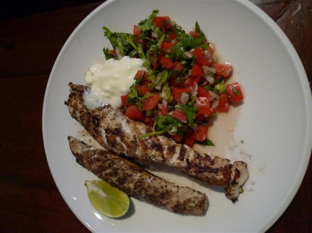 Cajun-spiced BBQ fish strips and salad